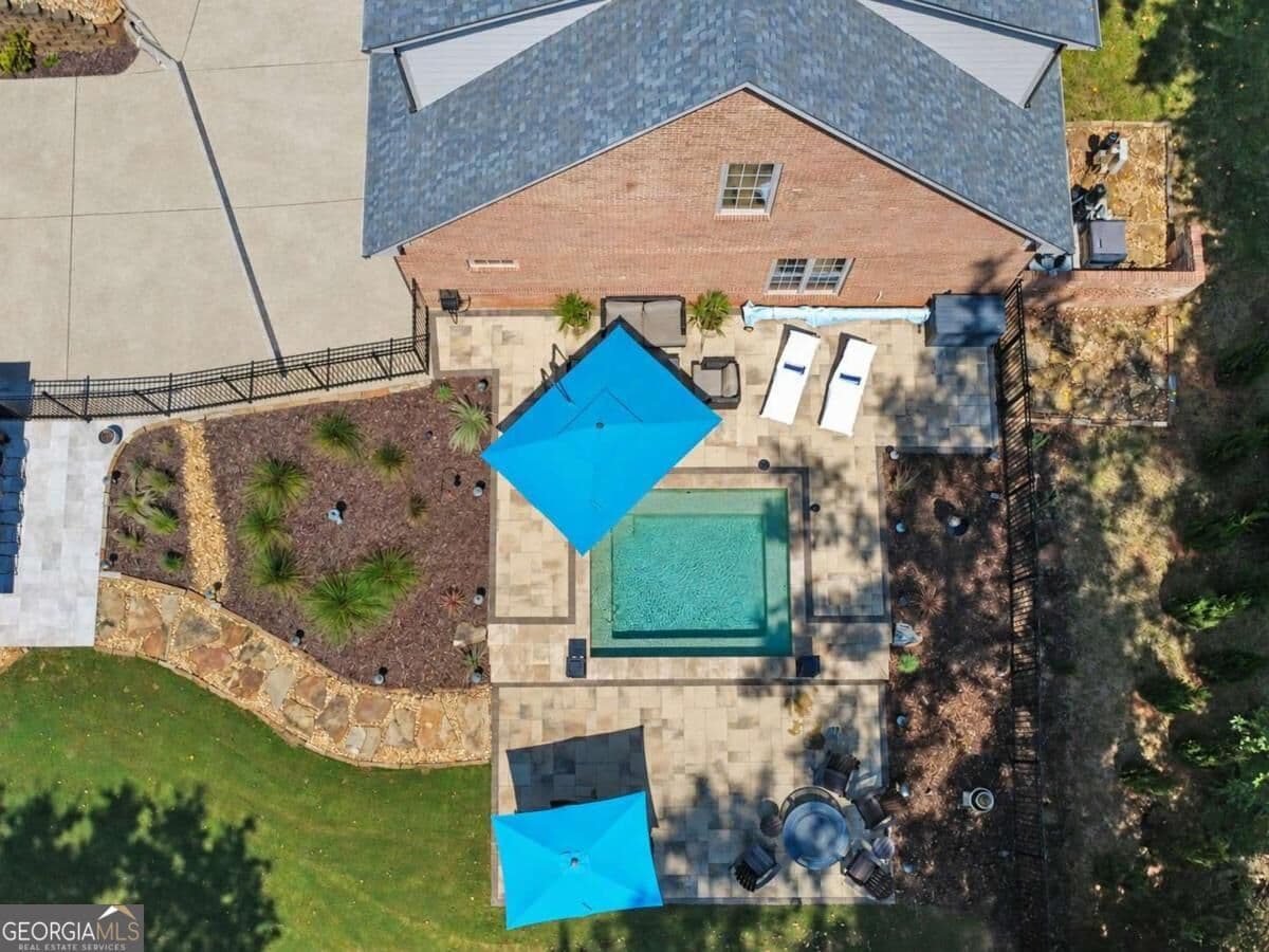 9 bedroom, 6 bathroom, 7,506 sq ft single family residence for sale at 116 River Bend Drive, Hoschton, GA 30548 — photo 9