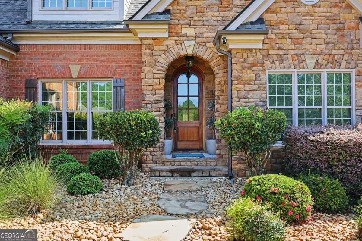 9 bedroom, 6 bathroom, 7,506 sq ft single family residence for sale at 116 River Bend Drive, Hoschton, GA 30548 — photo 10