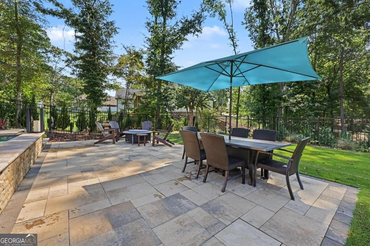 9 bedroom, 6 bathroom, 7,506 sq ft single family residence for sale at 116 River Bend Drive, Hoschton, GA 30548 — photo 4
