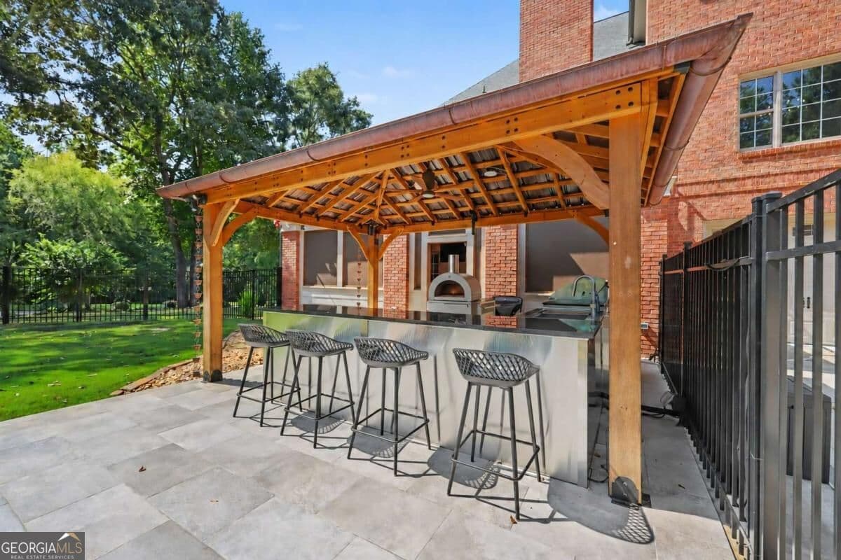 9 bedroom, 6 bathroom, 7,506 sq ft single family residence for sale at 116 River Bend Drive, Hoschton, GA 30548 — photo 8