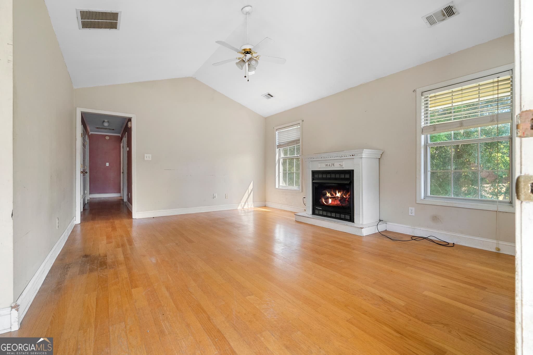 4 bedroom, 3 bathroom, 1,803 sq ft single family residence for sale at 1699 New Hope Road, Locust Grove, GA 30248 — photo 2