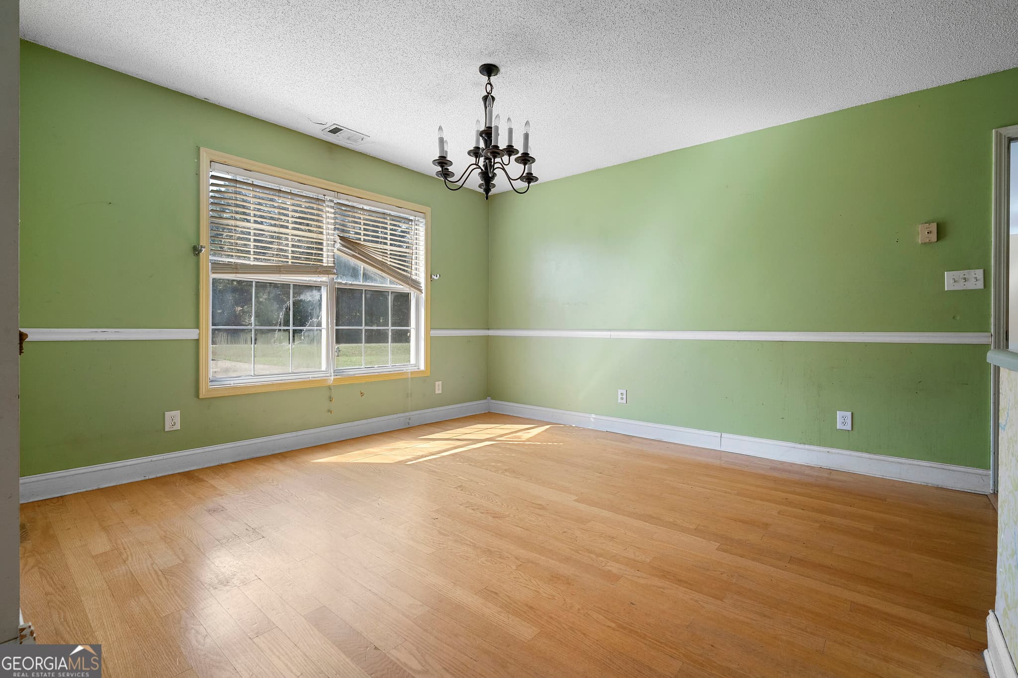 4 bedroom, 3 bathroom, 1,803 sq ft single family residence for sale at 1699 New Hope Road, Locust Grove, GA 30248 — photo 5