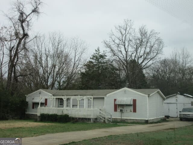 3 bedroom, 2 bathroom, 1,544 sq ft manufactured home,single family residence for sale at 71 Highpoint Lane, Locust Grove, GA 30248 — photo 1 of 3