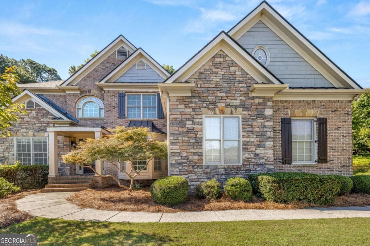 5 bedroom, 4 bathroom, 4,118 sq ft single family residence for rent at 1475 Boomer Circle, Suwanee, GA 30024 for $4,750 a month — photo 1 of 54