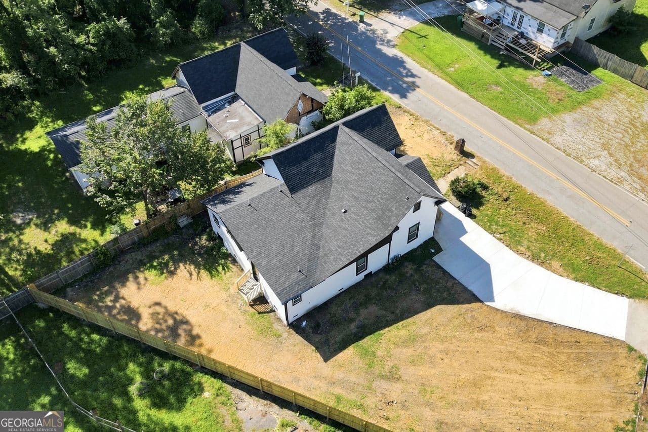5 bedroom, 4.5 bathroom, 1,612 sq ft single family residence for sale at 7516 Conyers Street, Lithonia, GA 30058 — photo 7