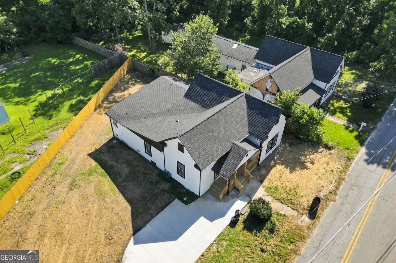 5 bedroom, 4.5 bathroom, 1,612 sq ft single family residence for sale at 7516 Conyers Street, Lithonia, GA 30058 — photo 8