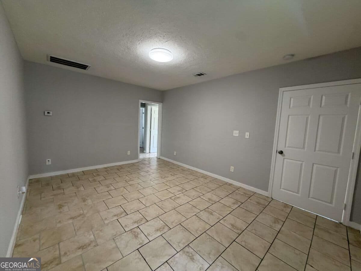 4 bedroom, 2 bathroom, 1,594 sq ft single family residence for sale at 3851/3857 Cochran Avenue, Brunswick, GA 31520 — photo 3