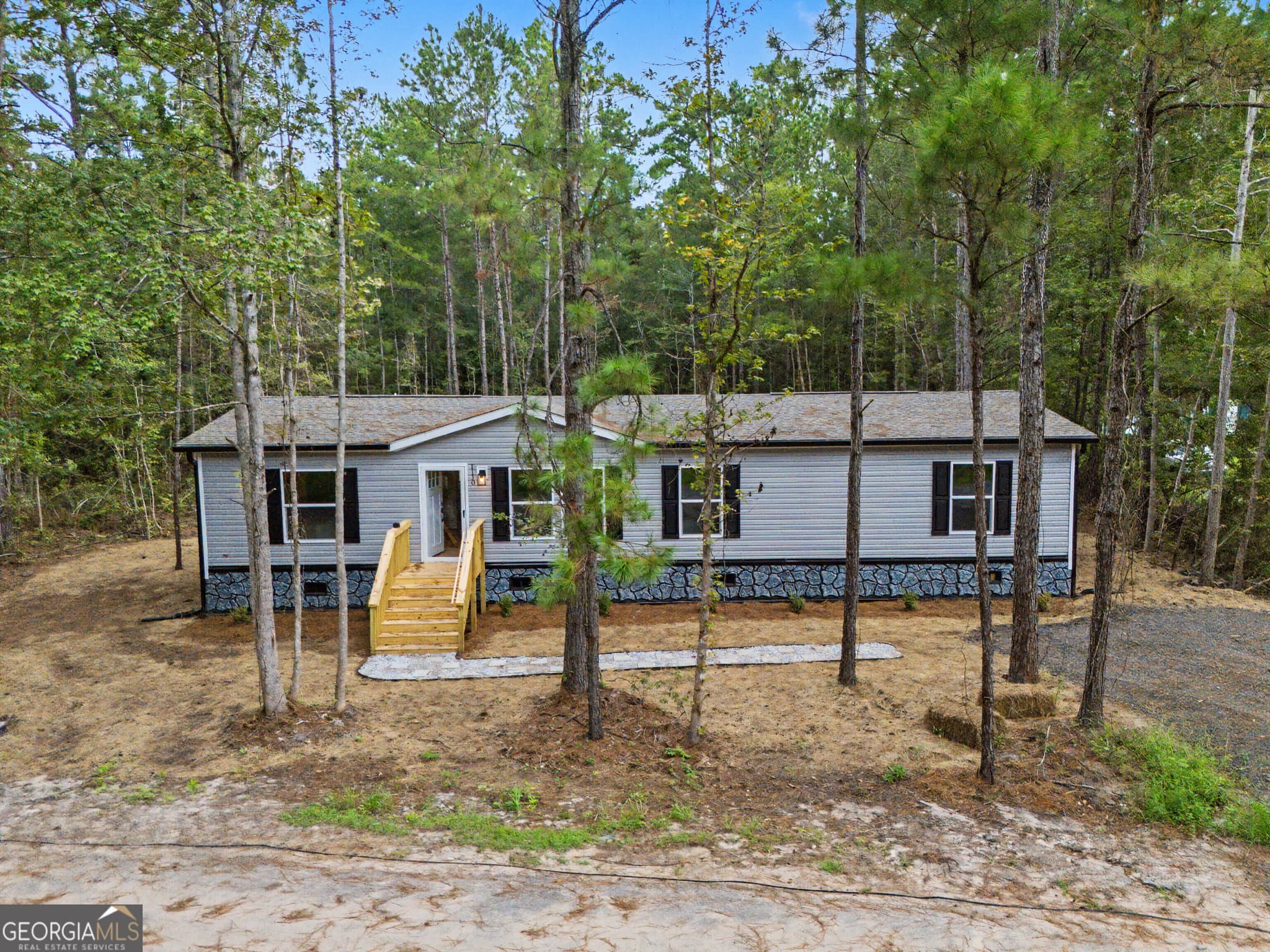 4 bedroom, 2 bathroom manufactured home,single family residence for sale at 1110 Lecounte Road, Townsend, GA 31331 — photo 2