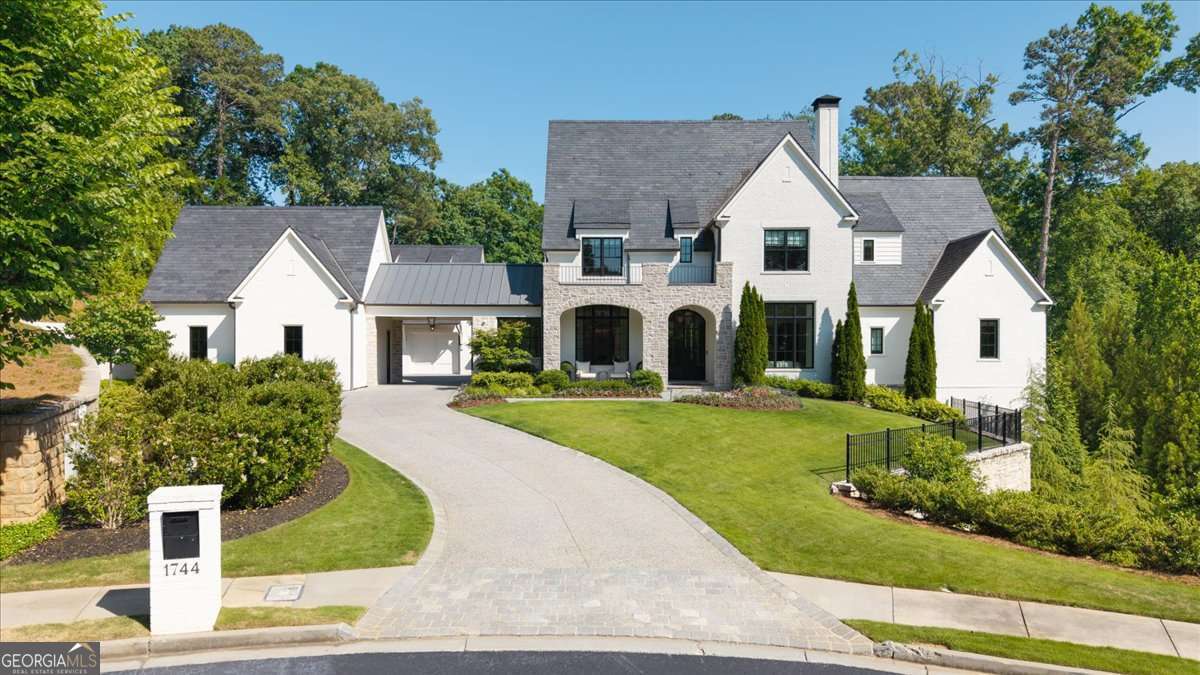 6 bedroom, 7.5 bathroom, 10,173 sq ft single family residence sold at 1744 Randall Mill Way, Atlanta, GA 30327