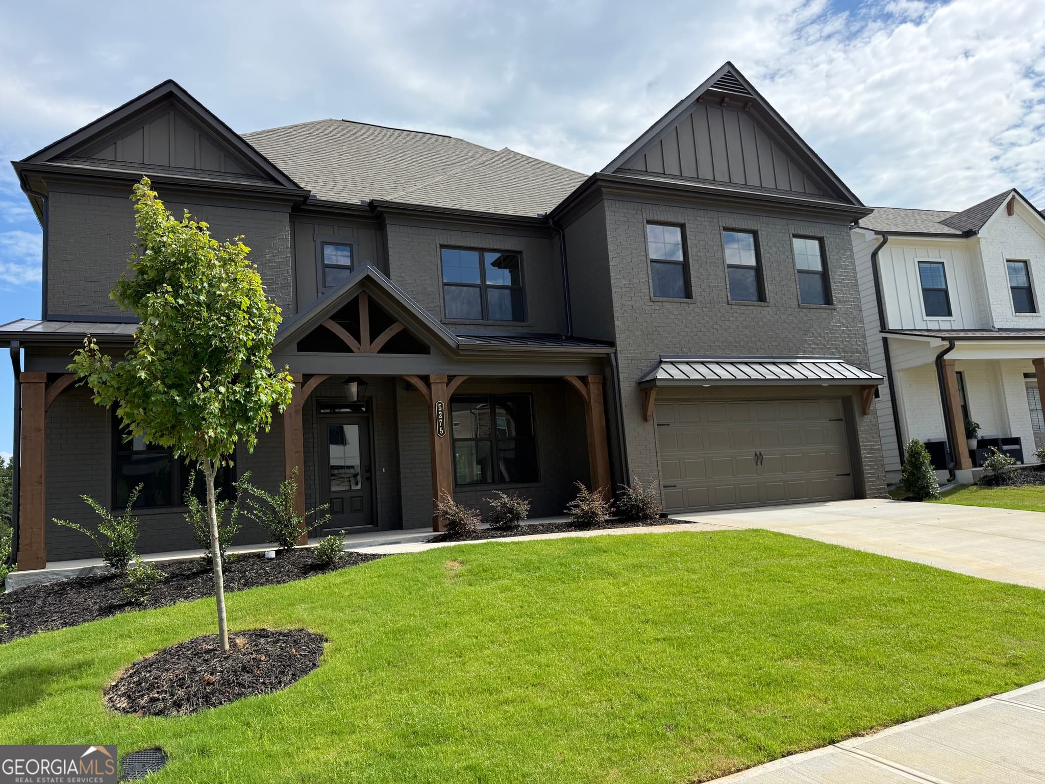 5 bedroom, 4 bathroom, 3,530 sq ft single family residence for sale at 5275 Baymont Drive, Gainesville, GA 30507 — photo 2