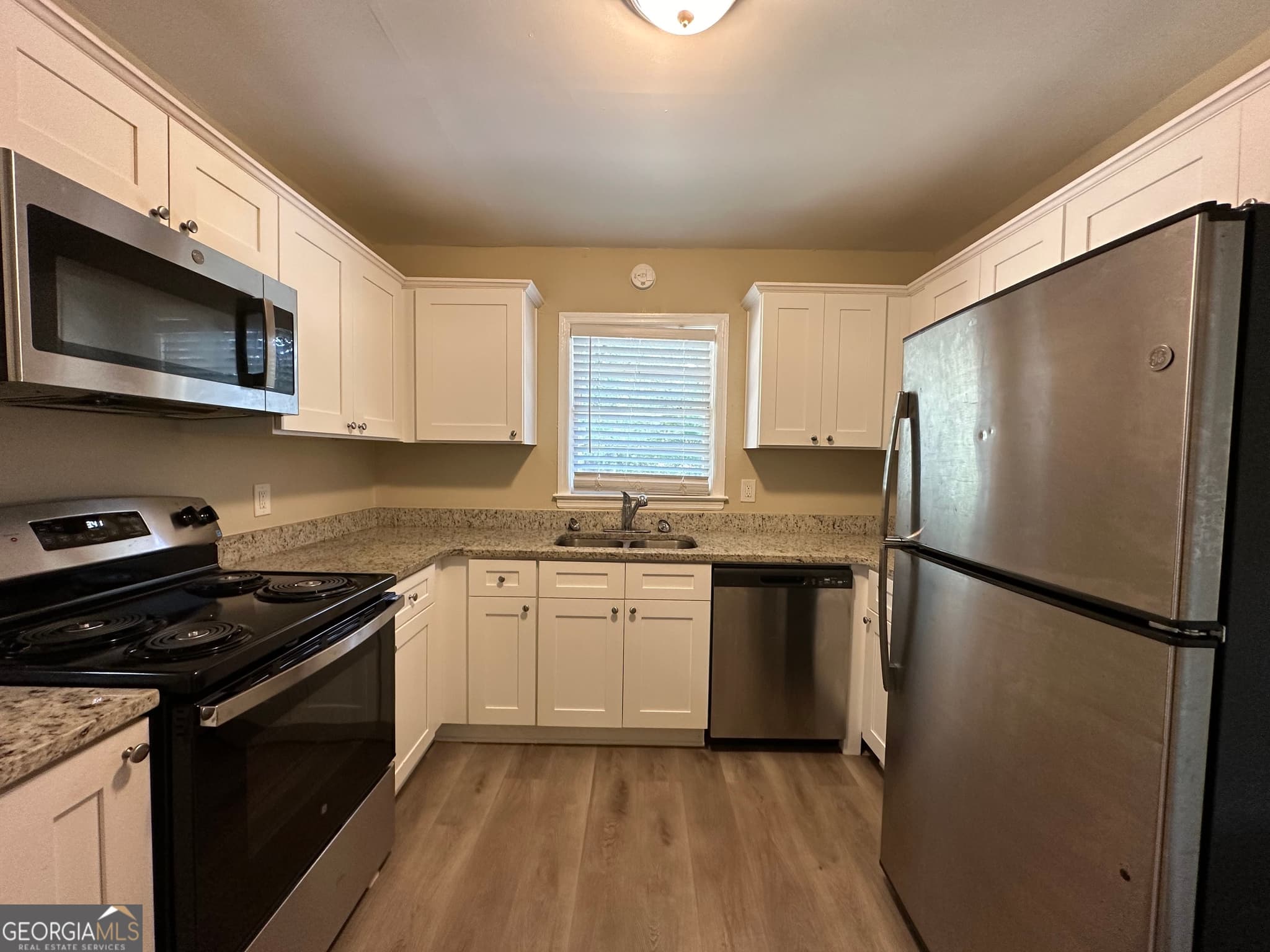 4 bedroom, 2 bathroom, 1,294 sq ft single family residence for sale at 1581 Hollyhock Terrace, Decatur, GA 30032 — photo 6