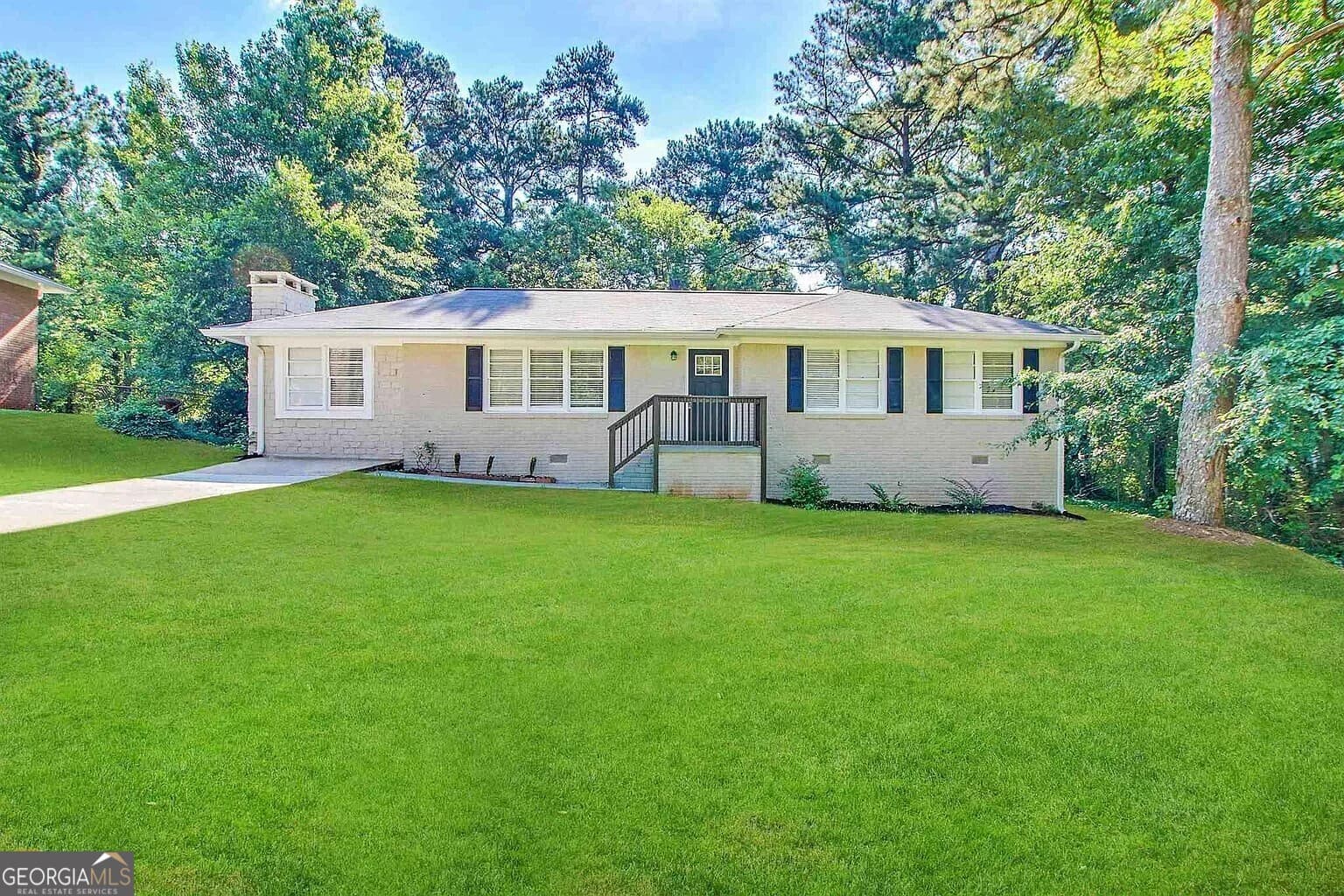 4 bedroom, 2 bathroom, 1,294 sq ft single family residence for sale at 1581 Hollyhock Terrace, Decatur, GA 30032 — photo 1 of 13