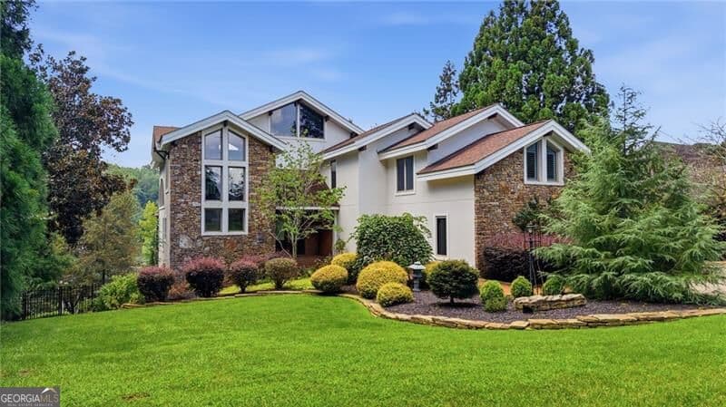 3 bedroom, 3.5 bathroom, 3,599 sq ft single family residence for sale at 4217 Tall Hickory Trail, Gainesville, GA 30506 — photo 1 of 68