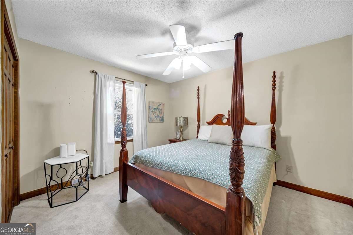5 bedroom, 4.5 bathroom, 4,293 sq ft single family residence for sale at 3024 Ravenwolfe Way, Snellville, GA 30039 — photo 6