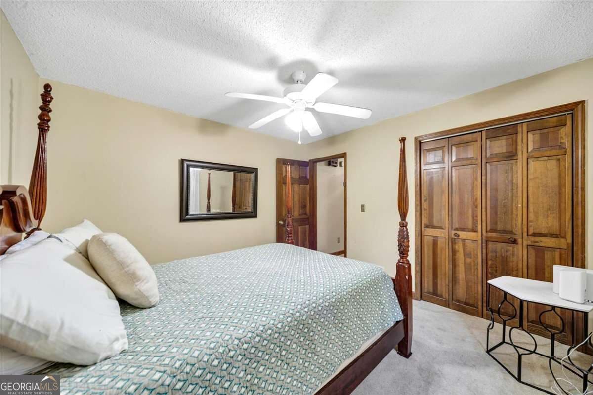 5 bedroom, 4.5 bathroom, 4,293 sq ft single family residence for sale at 3024 Ravenwolfe Way, Snellville, GA 30039 — photo 7