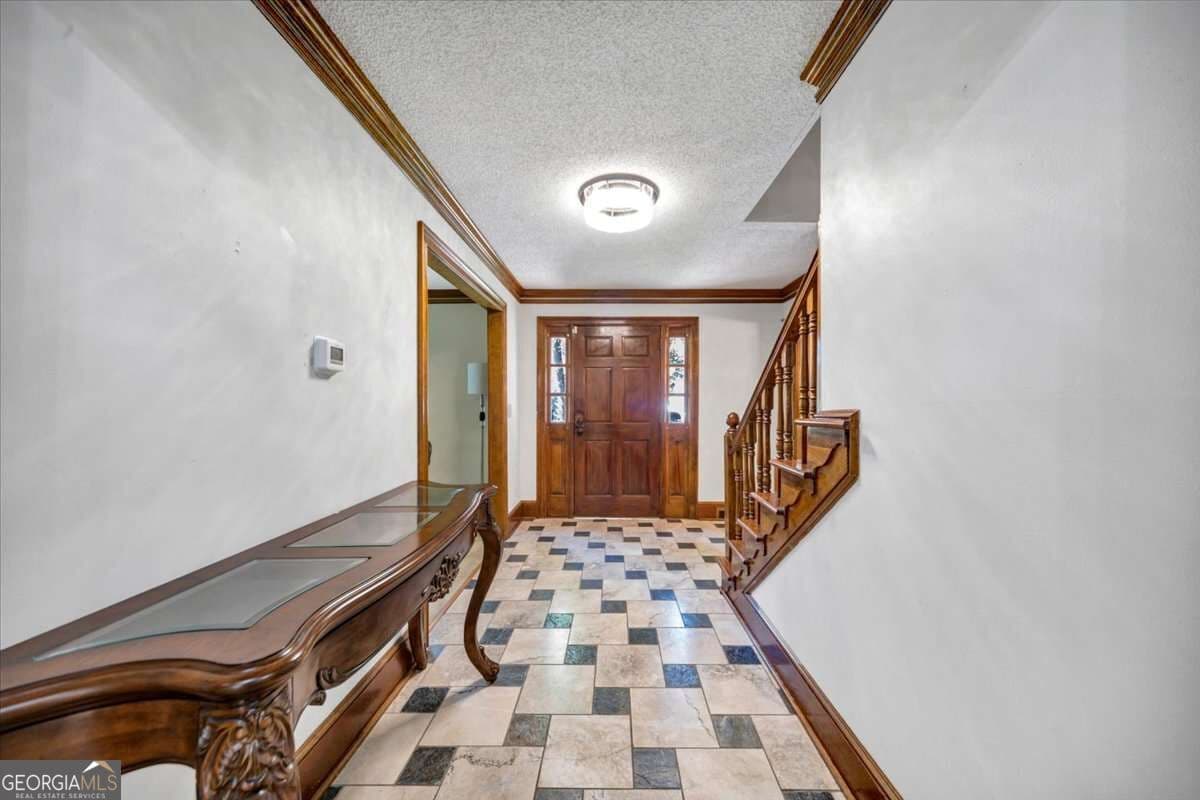 5 bedroom, 4.5 bathroom, 4,293 sq ft single family residence for sale at 3024 Ravenwolfe Way, Snellville, GA 30039 — photo 3