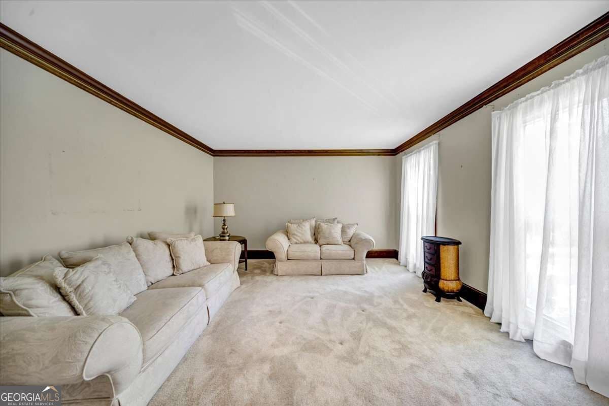5 bedroom, 4.5 bathroom, 4,293 sq ft single family residence for sale at 3024 Ravenwolfe Way, Snellville, GA 30039 — photo 4