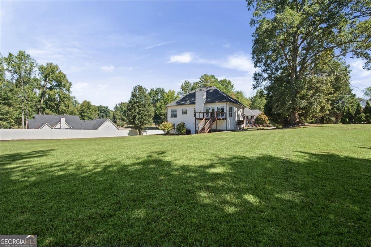 4 bedroom, 3 bathroom, 2,406 sq ft single family residence for sale at 136 Huntcliff Trail, Ellenwood, GA 30294 — photo 7