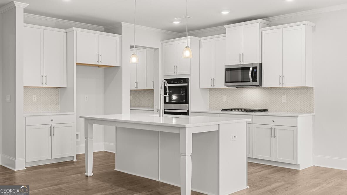4 bedroom, 3 bathroom, 3,106 sq ft single family residence for sale at 7197 Bocholt Drive, South Fulton, GA 30349 — photo 5