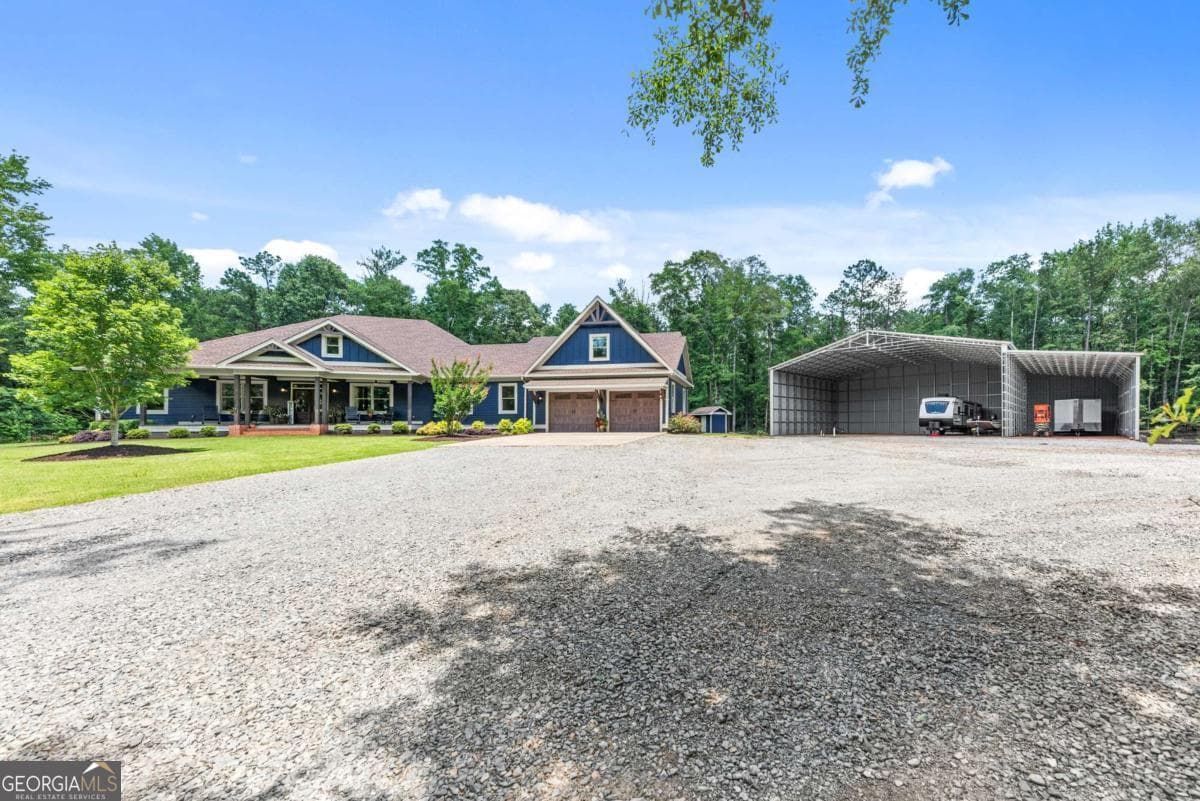 4 bedroom, 4 bathroom, 4,001 sq ft single family residence for sale at 4835 J R Sims Road, Irwinton, GA 31042 — photo 2