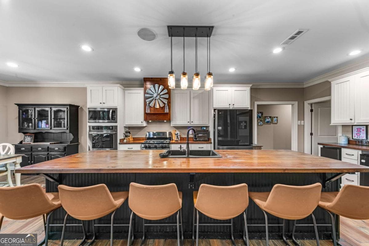 4 bedroom, 4 bathroom, 4,001 sq ft single family residence for sale at 4835 J R Sims Road, Irwinton, GA 31042 — photo 10