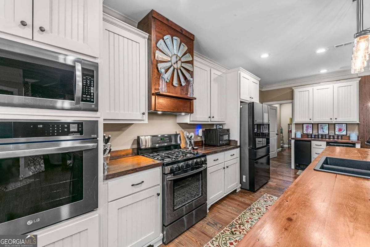 4 bedroom, 4 bathroom, 4,001 sq ft single family residence for sale at 4835 J R Sims Road, Irwinton, GA 31042 — photo 8