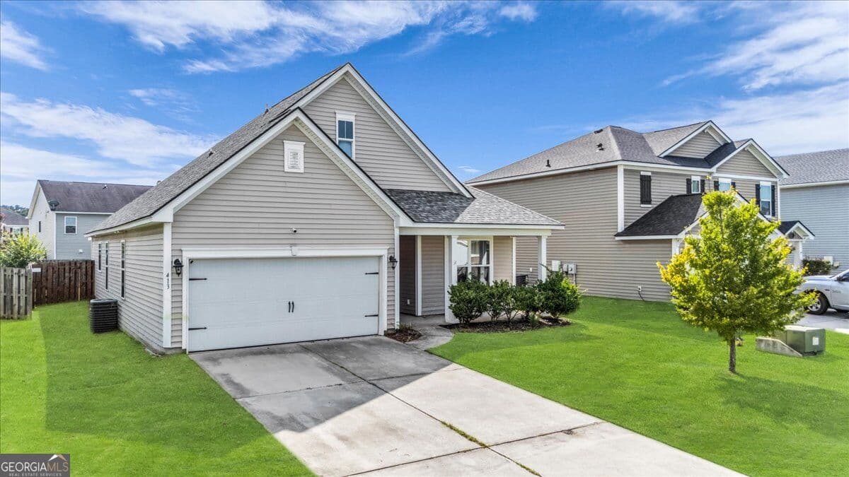 4 bedroom, 3 bathroom, 2,162 sq ft single family residence for sale at 413 Lions Den Drive, Pooler, GA 31322 — photo 2