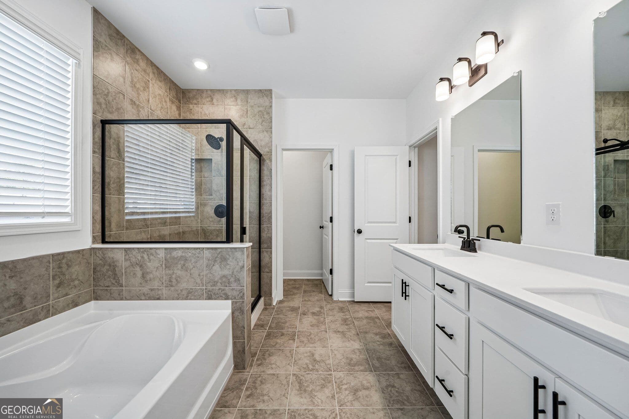 4 bedroom, 3.5 bathroom, 2,498 sq ft single family residence for sale at 1673 Caldwell Bend Lane, Dacula, GA 30019 — photo 4