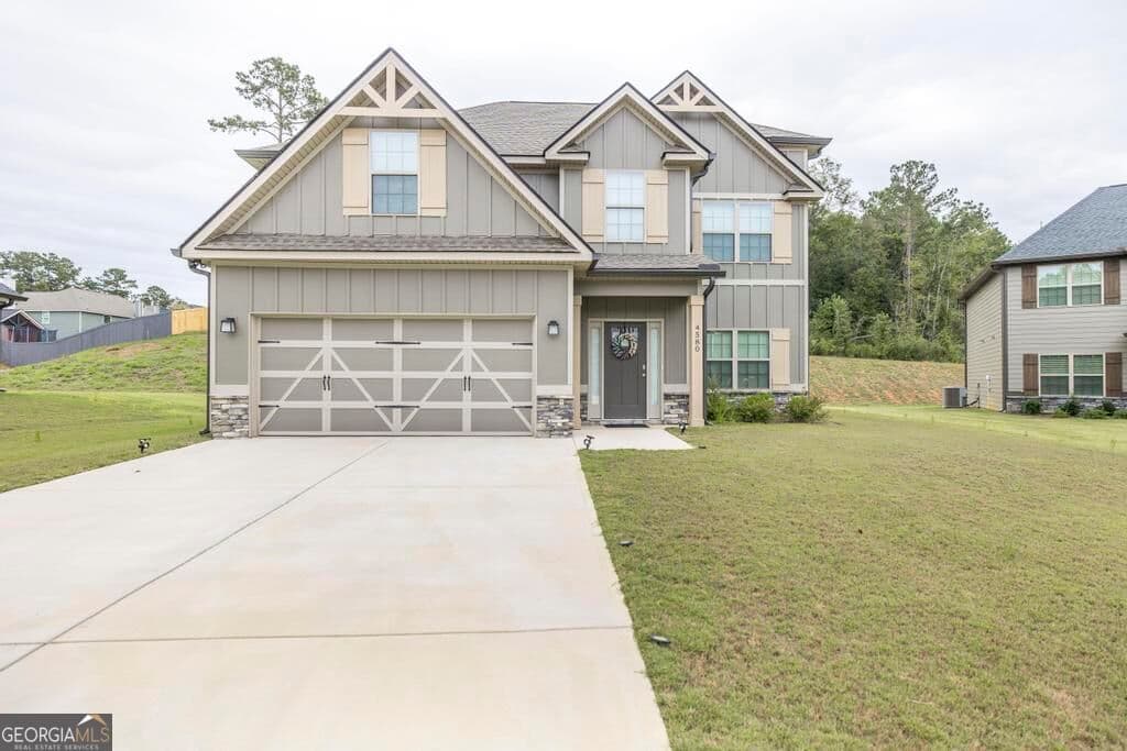 4 bedroom, 2.5 bathroom, 2,466 sq ft single family residence for sale at 4580 Capulet Court, Forsyth, GA 31029 — photo 2