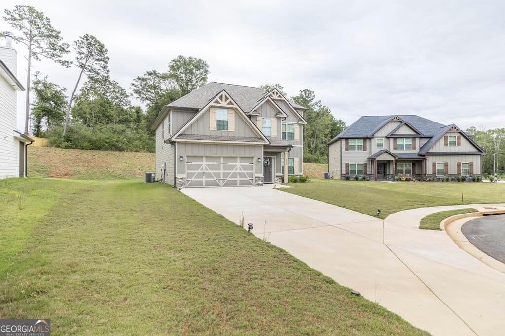 4 bedroom, 2.5 bathroom, 2,466 sq ft single family residence for sale at 4580 Capulet Court, Forsyth, GA 31029 — photo 3