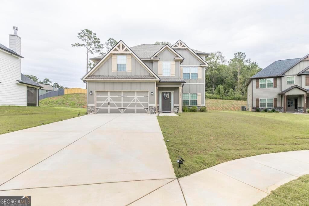 4 bedroom, 2.5 bathroom, 2,466 sq ft single family residence for sale at 4580 Capulet Court, Forsyth, GA 31029 — photo 1 of 35