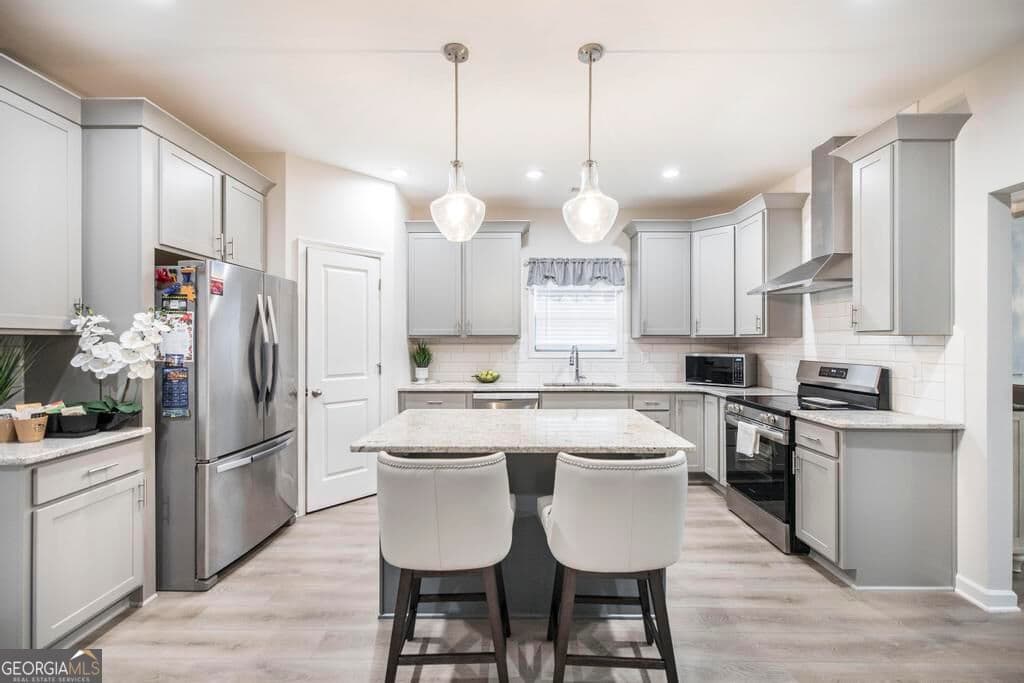 4 bedroom, 2.5 bathroom, 2,466 sq ft single family residence for sale at 4580 Capulet Court, Forsyth, GA 31029 — photo 9