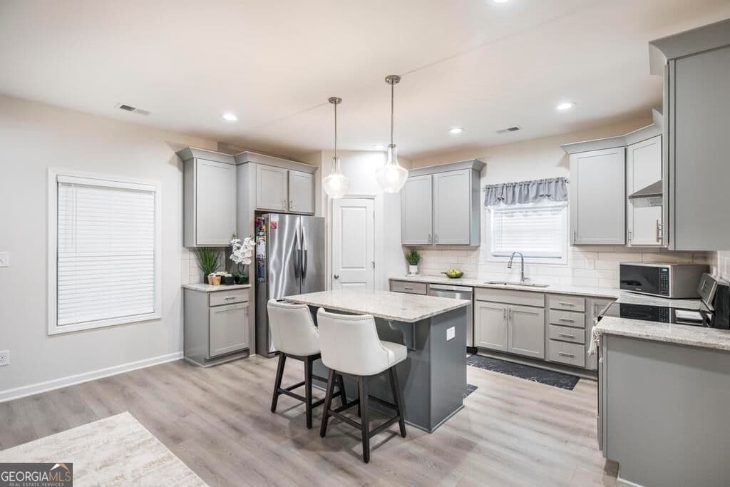 4 bedroom, 2.5 bathroom, 2,466 sq ft single family residence for sale at 4580 Capulet Court, Forsyth, GA 31029 — photo 8