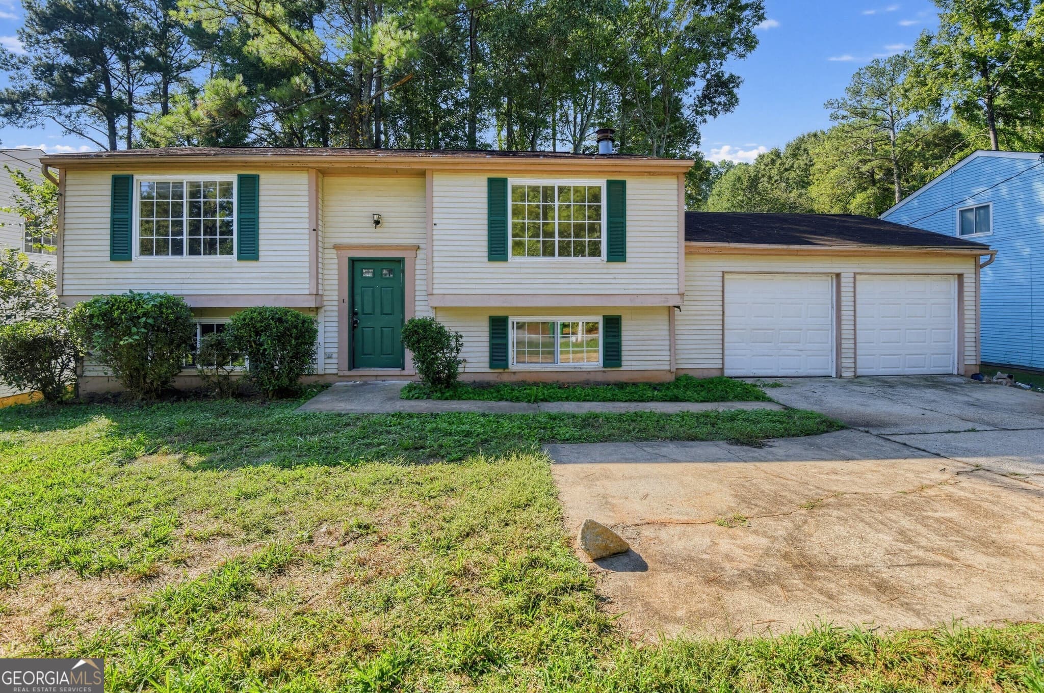 4 bedroom, 2 bathroom, 1,788 sq ft single family residence for sale at 4755 White Oak Trail, Stone Mountain, GA 30088