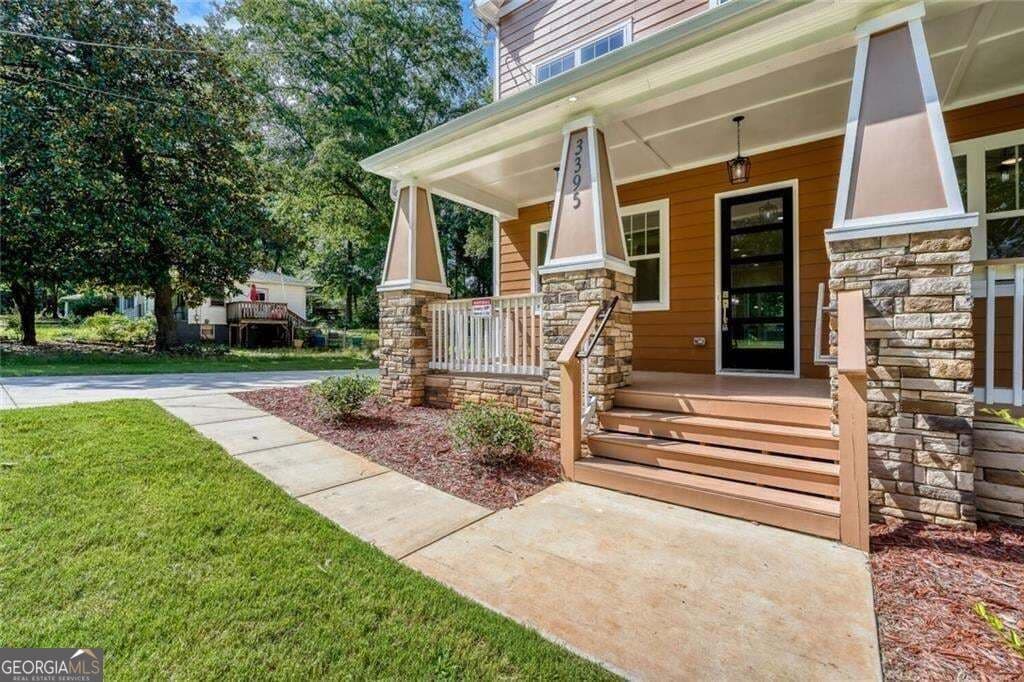 7 bedroom, 4 bathroom, 3,400 sq ft single family residence for sale at 3395 Lee Place, Atlanta, GA 30349 — photo 2