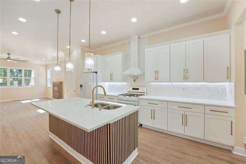 7 bedroom, 4 bathroom, 3,400 sq ft single family residence for sale at 3395 Lee Place, Atlanta, GA 30349 — photo 6