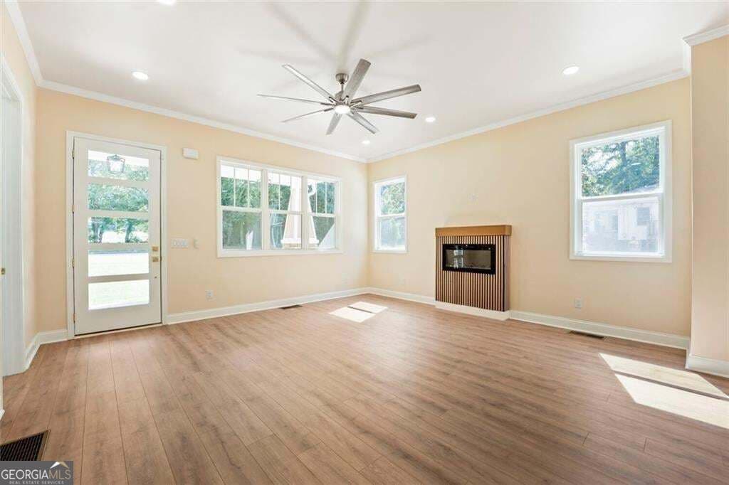 7 bedroom, 4 bathroom, 3,400 sq ft single family residence for sale at 3395 Lee Place, Atlanta, GA 30349 — photo 5
