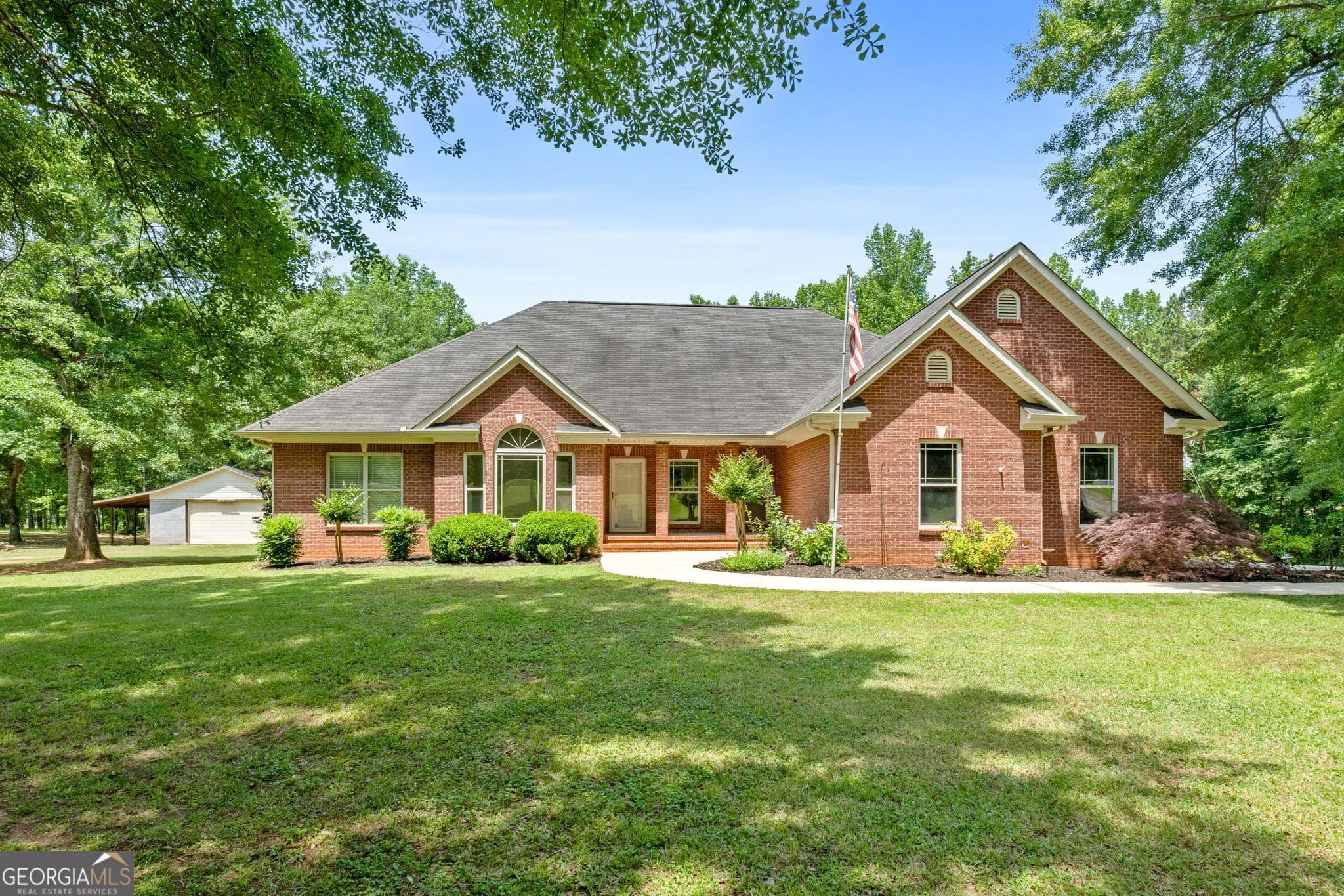 5 bedroom, 4 bathroom, 3,496 sq ft single family residence sold at 1324 Alabama Road, Meansville, GA 30256