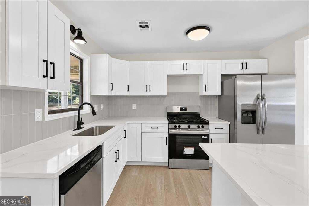 3 bedroom, 2.5 bathroom, 1,965 sq ft single family residence for sale at 1307 Heritage Court, Hampton, GA 30228 — photo 7