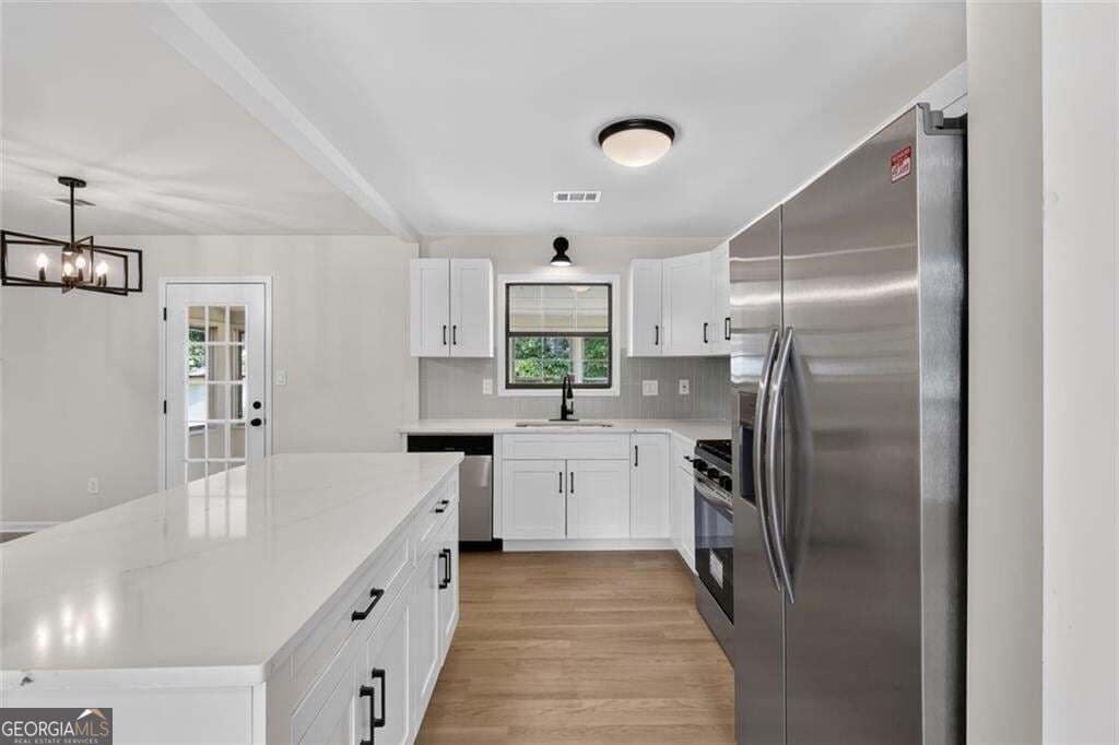 3 bedroom, 2.5 bathroom, 1,965 sq ft single family residence for sale at 1307 Heritage Court, Hampton, GA 30228 — photo 8