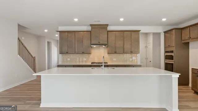 6 bedroom, 5.5 bathroom, 3,829 sq ft single family residence for sale at 3955 Silver Pine Trail, Cumming, GA 30028 — photo 5