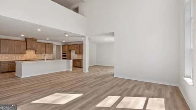 6 bedroom, 5.5 bathroom, 3,829 sq ft single family residence for sale at 3955 Silver Pine Trail, Cumming, GA 30028 — photo 8
