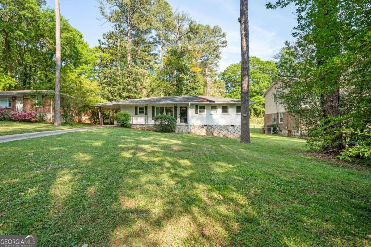 2 bedroom, 2 bathroom, 1,100 sq ft single family residence for sale at 1428 Sandy Lane, Decatur, GA 30032 — photo 2