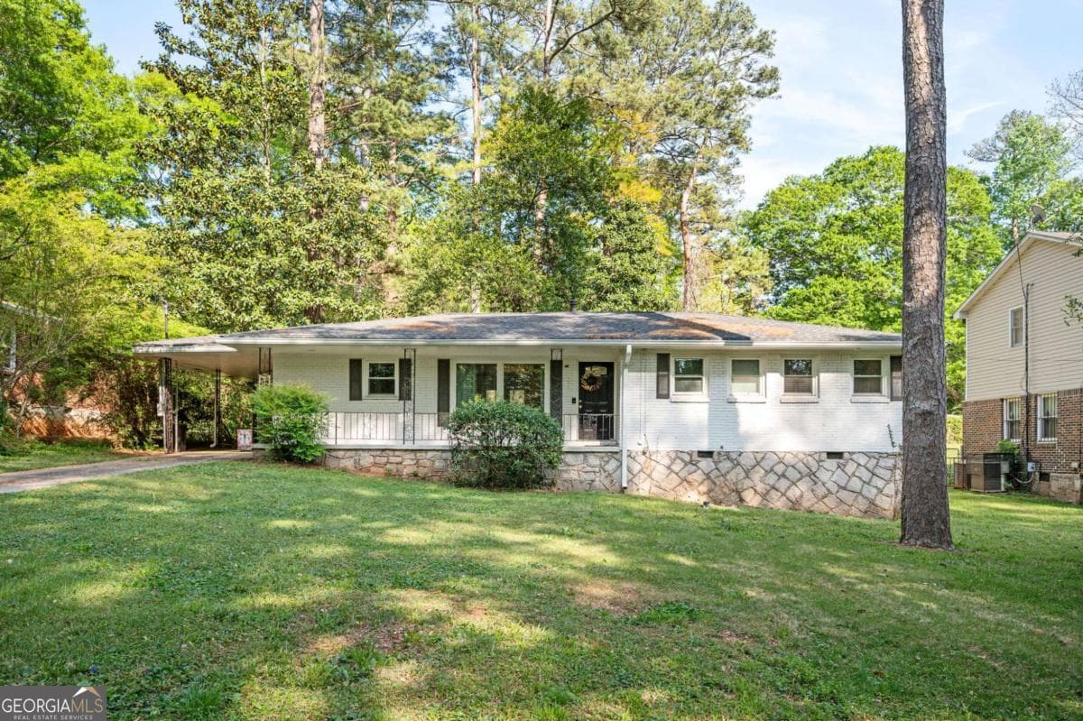 2 bedroom, 2 bathroom, 1,100 sq ft single family residence for sale at 1428 Sandy Lane, Decatur, GA 30032 — photo 1 of 29