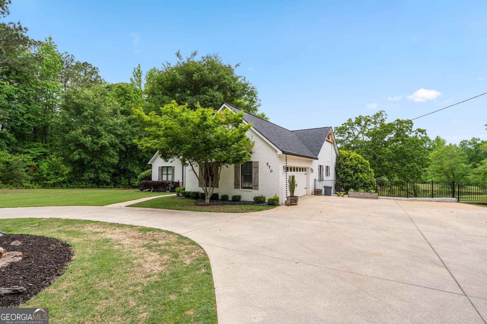 4 bedroom, 3 bathroom, 5,274 sq ft single family residence for sale at 570 Martin Mill Road, Moreland, GA 30259 — photo 3