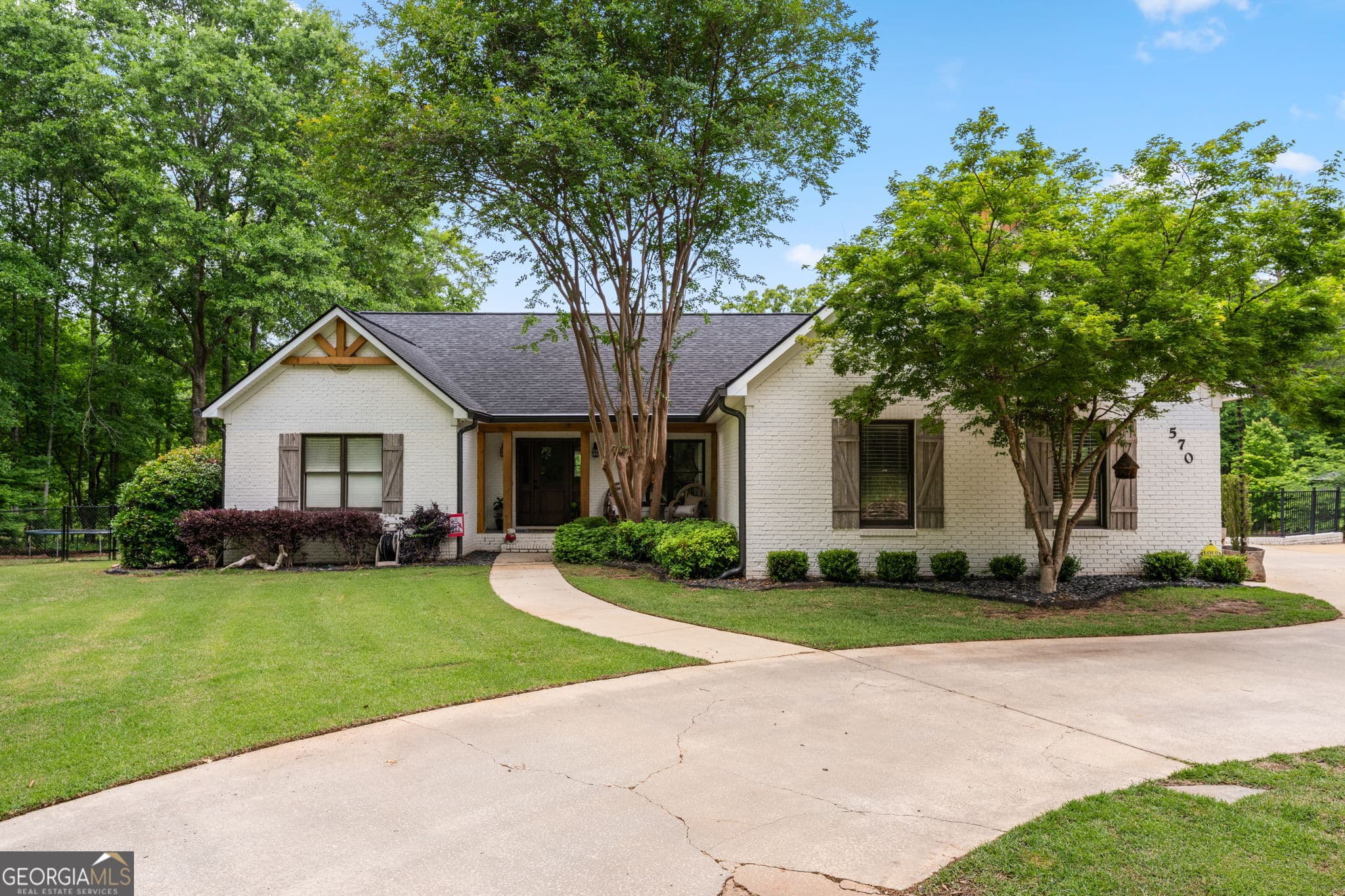 4 bedroom, 3 bathroom, 5,274 sq ft single family residence for sale at 570 Martin Mill Road, Moreland, GA 30259 — photo 1 of 68