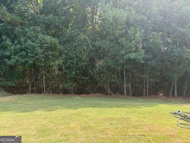 4 bedroom, 2.5 bathroom, 2,074 sq ft single family residence for sale at 135 Hunts Mill Circle, Griffin, GA 30224 — photo 6