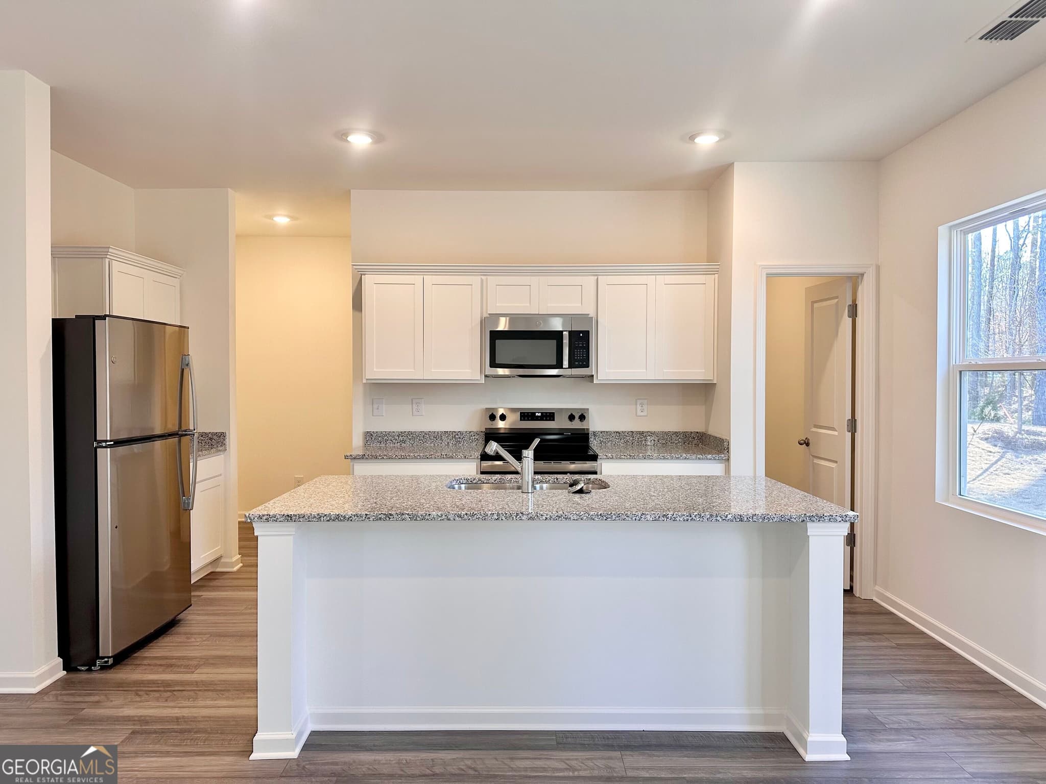 4 bedroom, 2.5 bathroom single family residence for sale at 394 Champions Boulevard, Dallas, GA 30157 — photo 4
