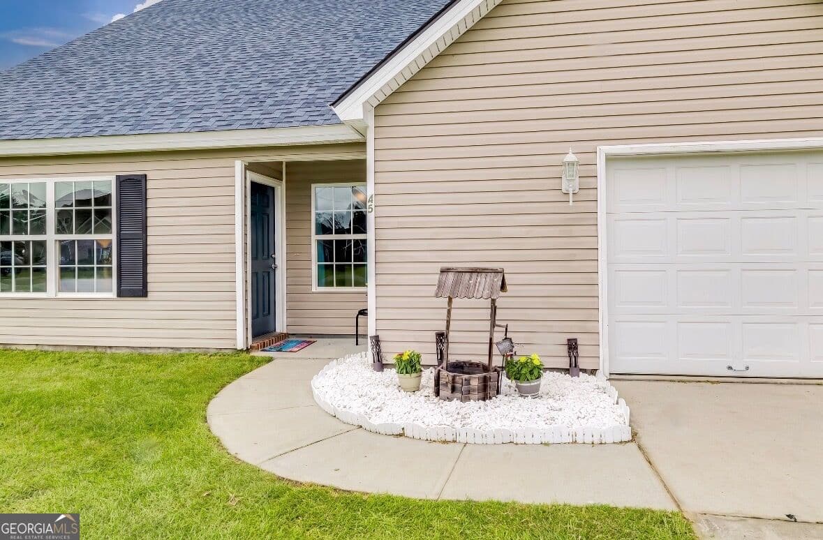 4 bedroom, 3 bathroom, 2,848 sq ft single family residence for sale at 45 Alvidine Lane, Ellabell, GA 31308 — photo 2