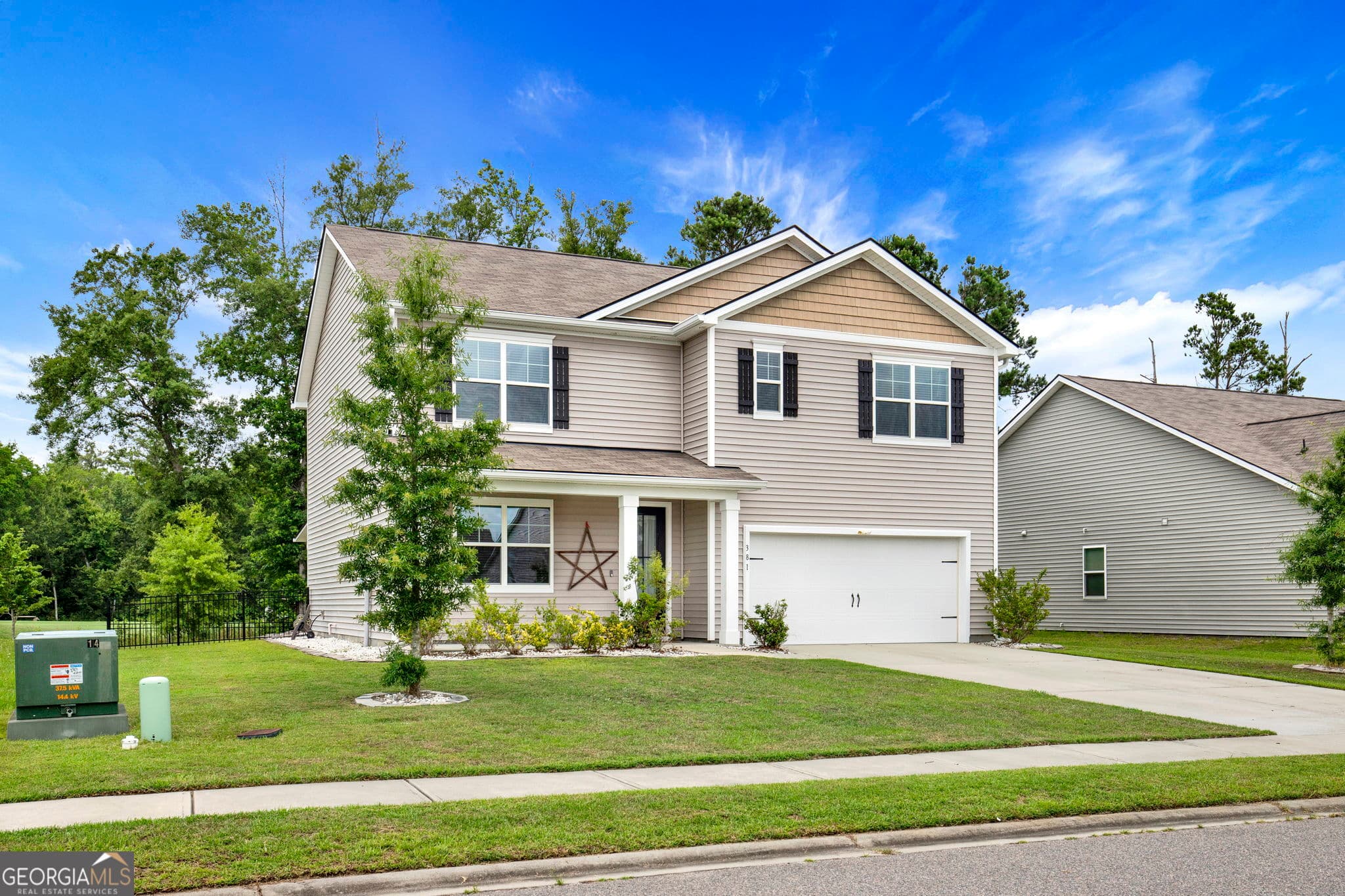 5 bedroom, 3 bathroom, 2,556 sq ft single family residence for sale at 381 Hogan Drive, Richmond Hill, GA 31324 — photo 2